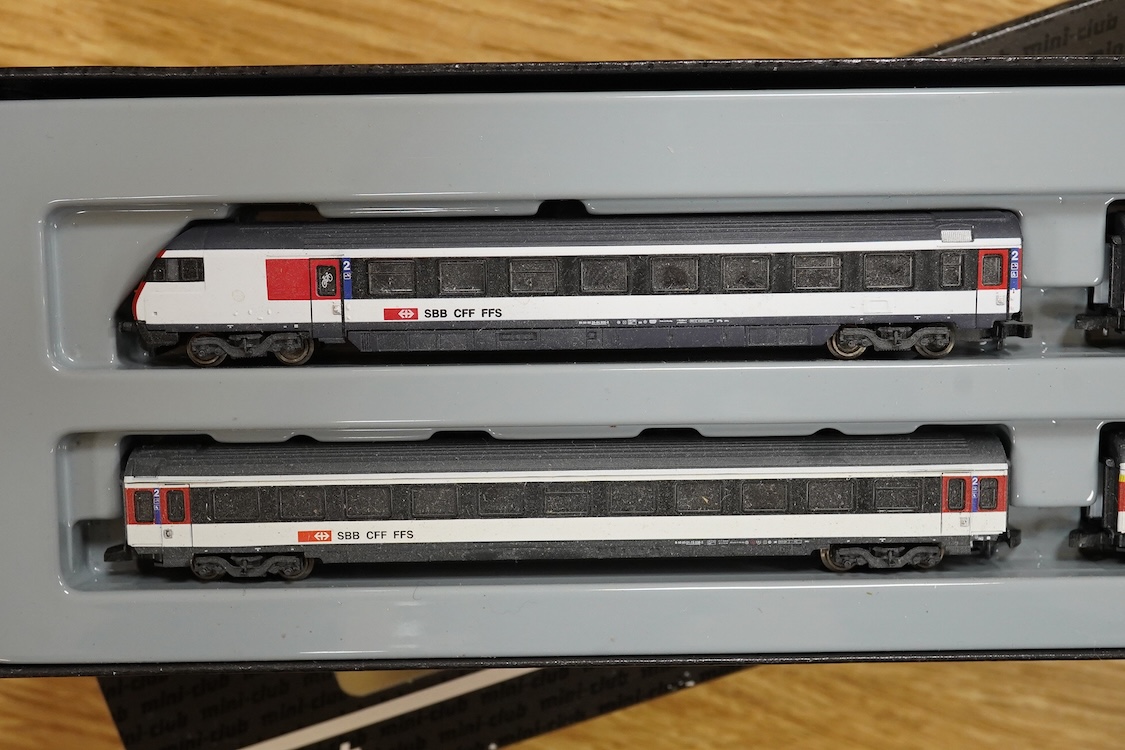 A Marklin Z gauge railway collection, Swiss railway from set 81852, including an SBB CFF FFS Bo-Bo pantograph electric locomotive, together with a boxed Mini-club unpowered 4-car set (87456), three freight wagons, a brid